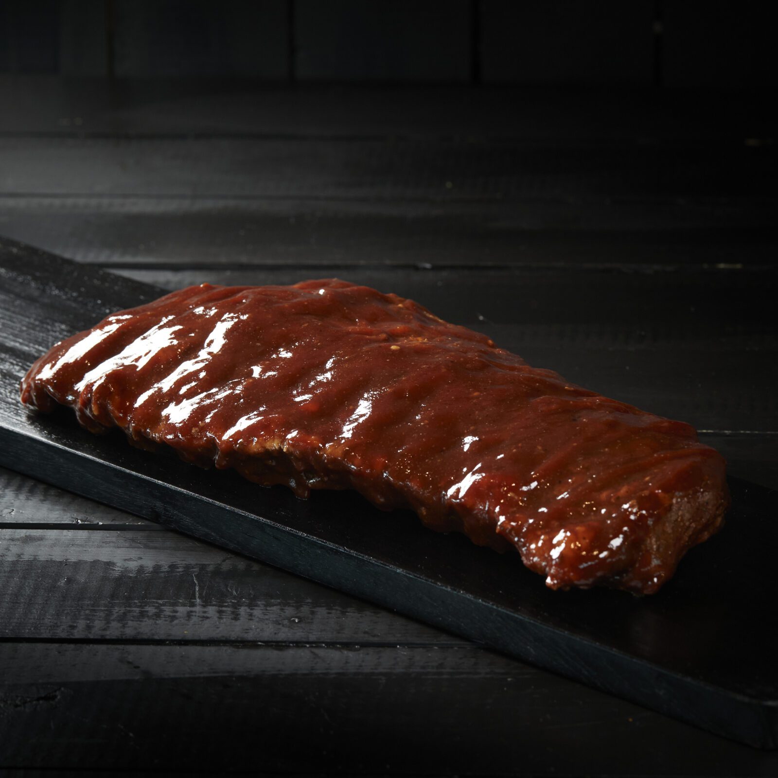 Grísarif elduð í BBQ